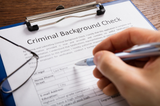 Filling out criminal record check form