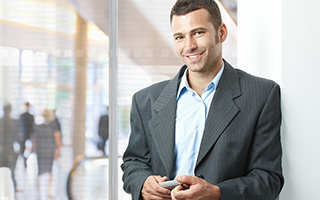 male sports agent in grey pinstriped blazer