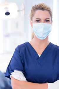 Dental hygienist wearing a surgical mask