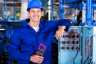 electrician wearing a hard hat while working on a job