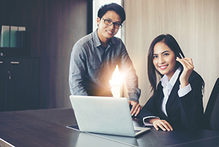 Smiling couple in an office