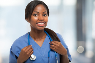 African American Nurse in blue scrubs with stethoscope
