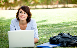 Student studying on a laptop